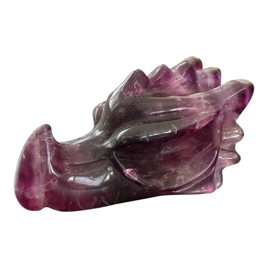 Purple fluorite crystal dragon head carving clean white background product shot