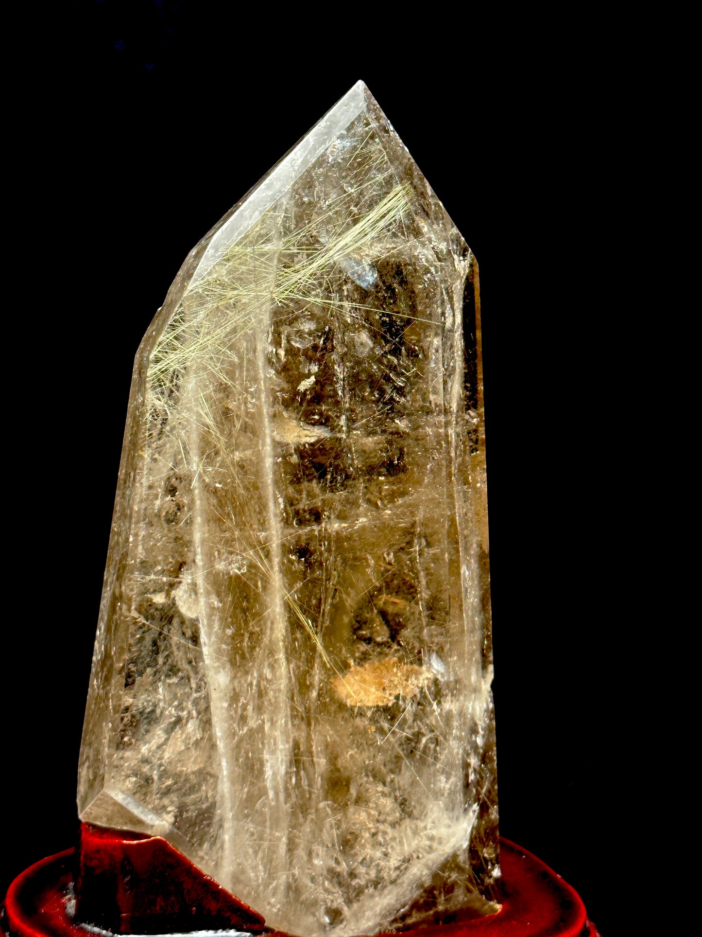 Smoky Quartz tower with silver rutile inclusions on wooden stand