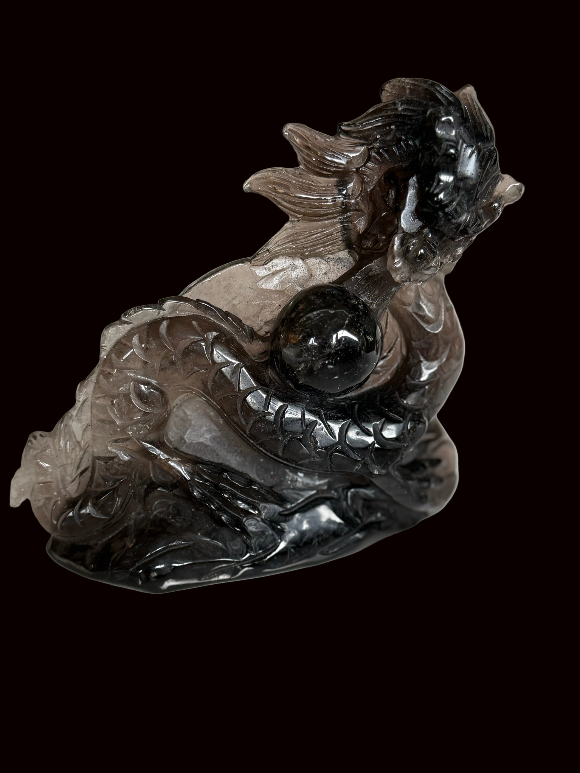 Smoky quartz dragon sculpture - side profile view