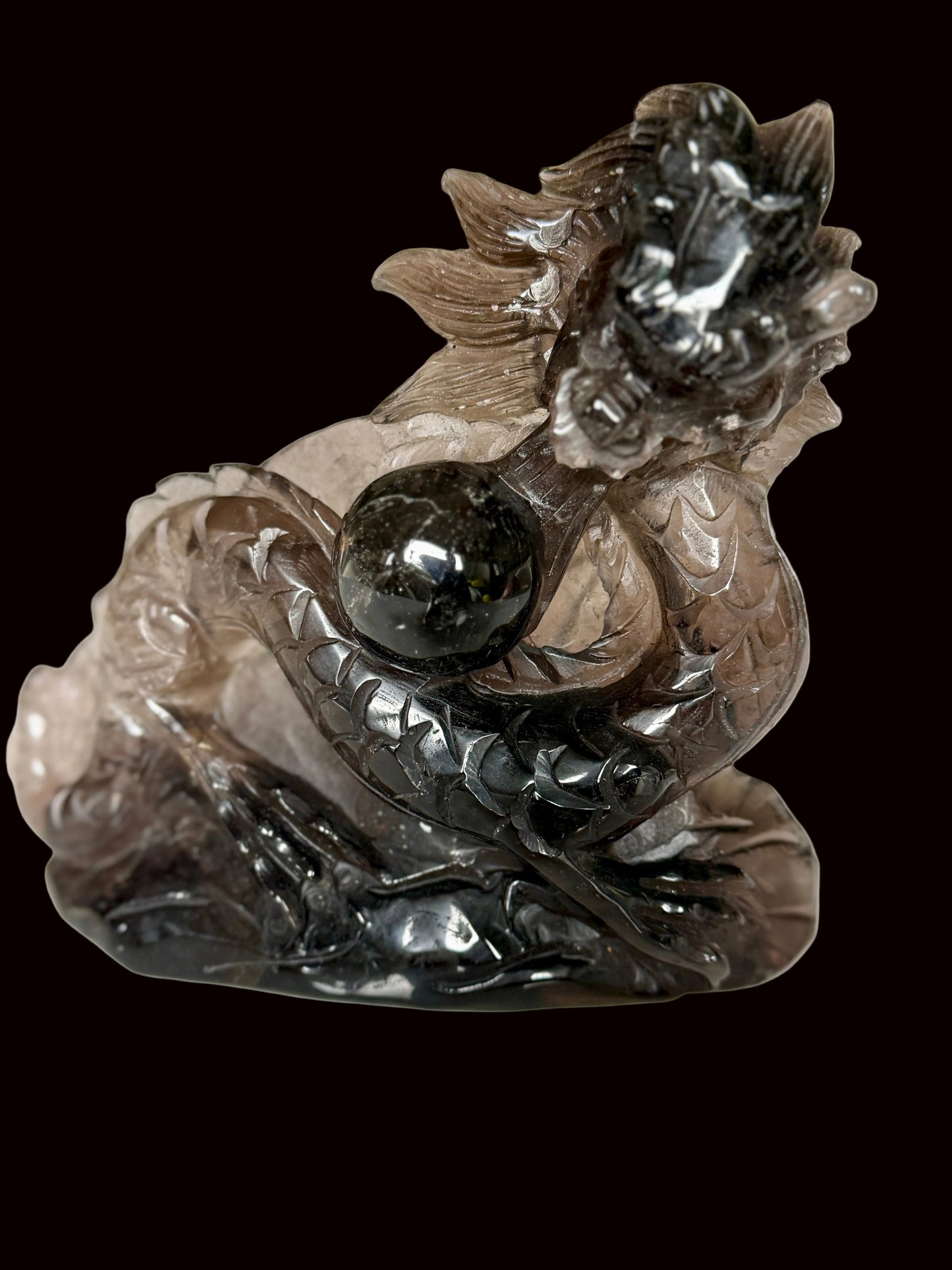 Smoky quartz dragon sculpture - alternate angle showing translucency