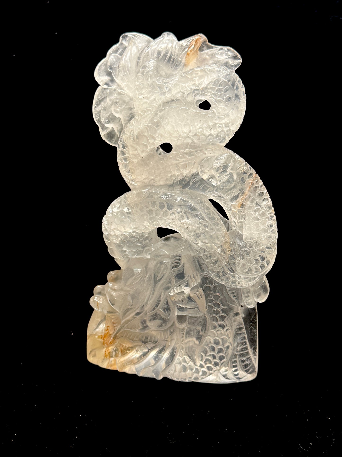 Clear quartz dragon carving - front view