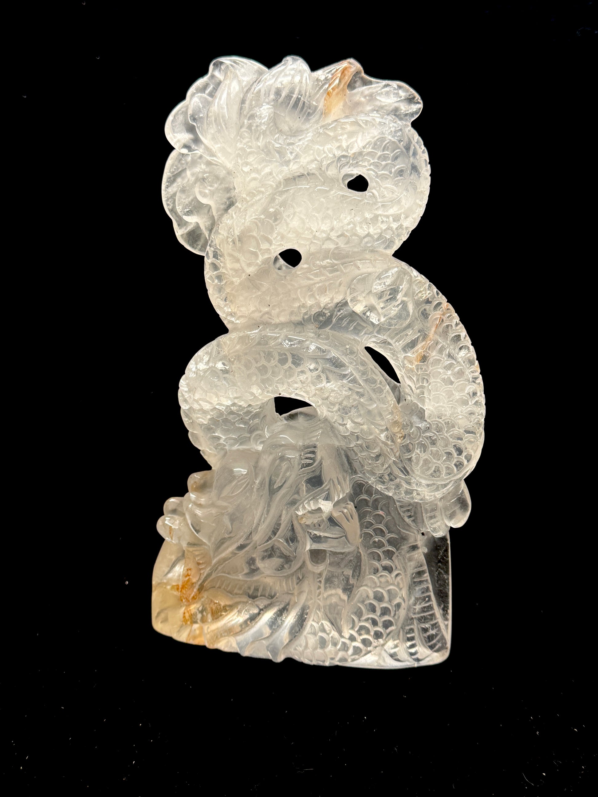 Clear quartz dragon carving - front view