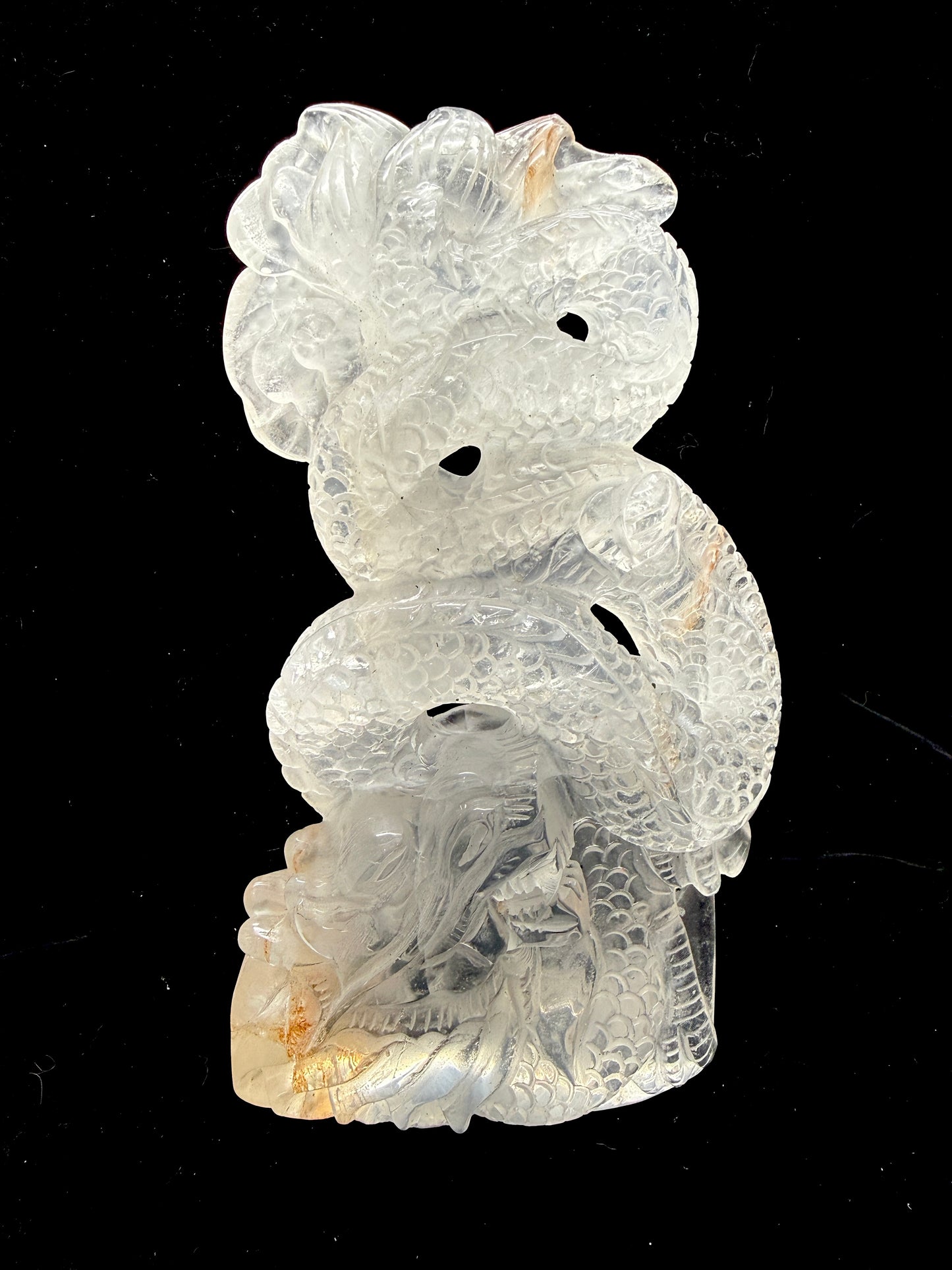 Clear quartz dragon carving - side view