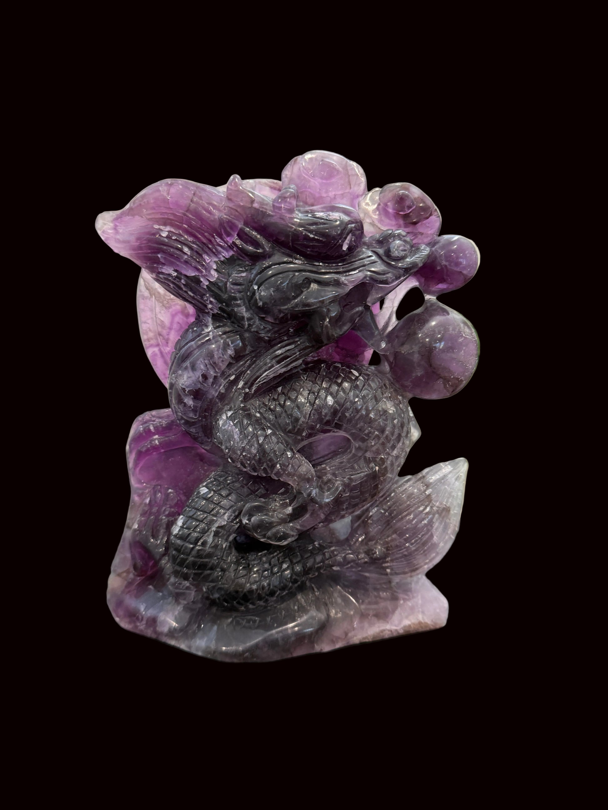 Purple fluorite dragon carving - lifestyle side view 2