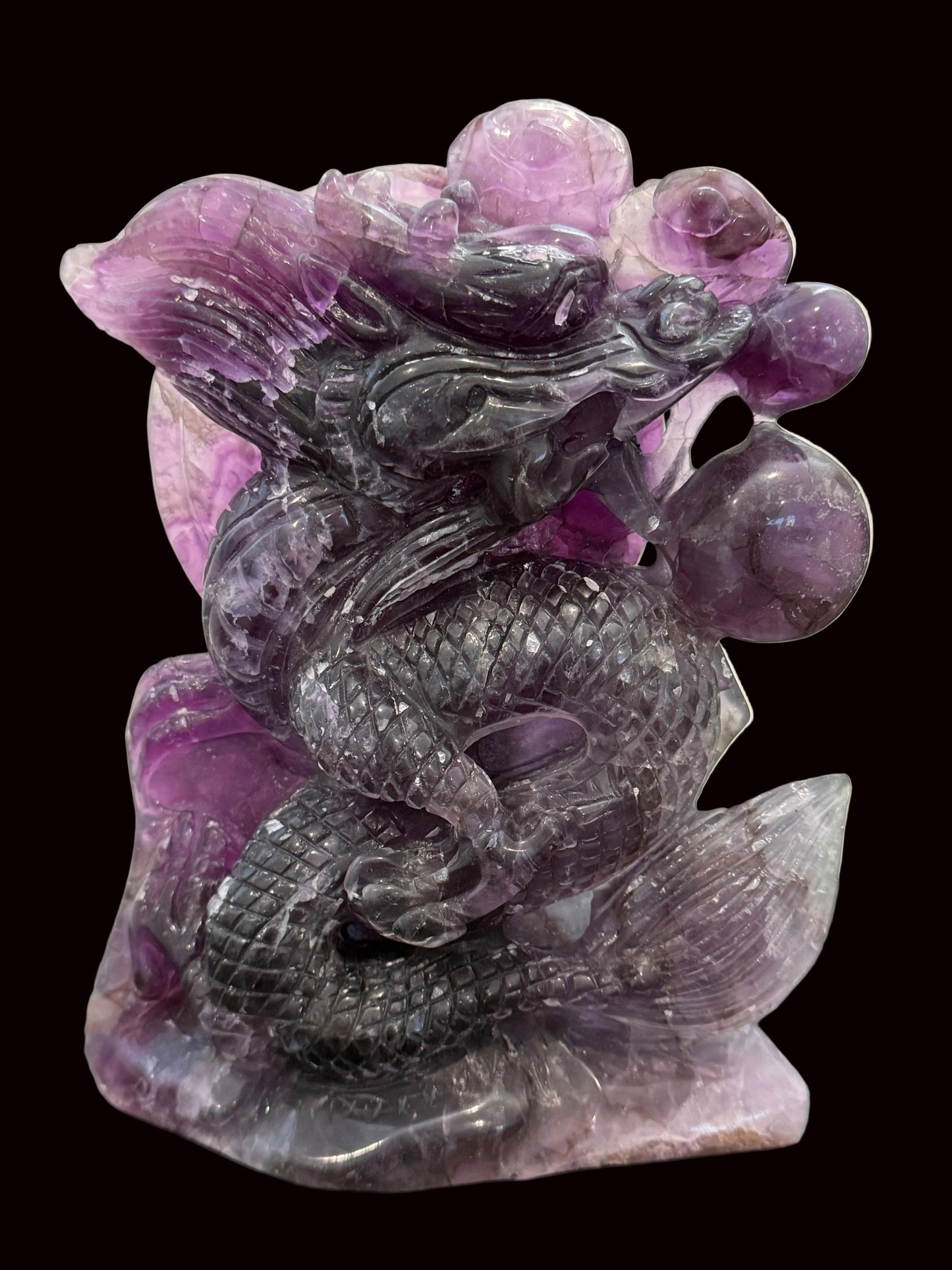 Purple fluorite dragon carving - lifestyle front view