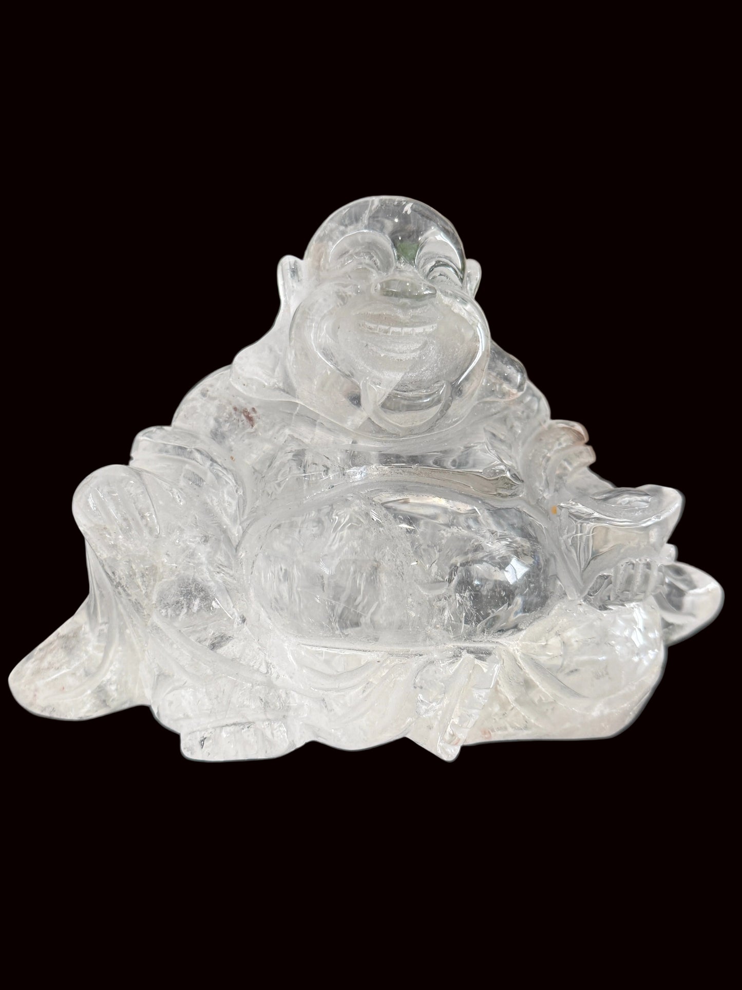 Clear quartz laughing Buddha carving - side view 1