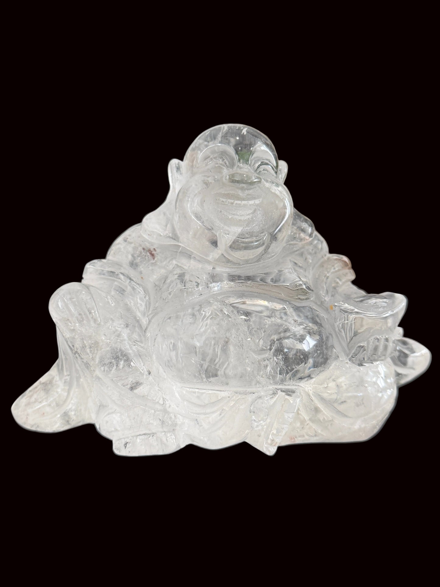 Clear quartz laughing Buddha carving - side view 2