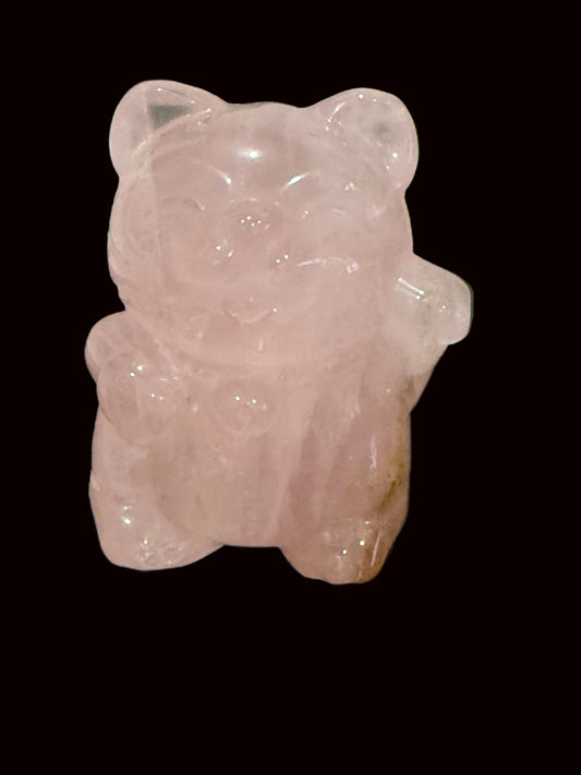 Rose quartz lucky waving cat carving front view showing soft pink translucency