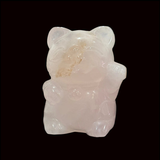 Rose quartz lucky waving cat carving front view showing cat face and raised paw