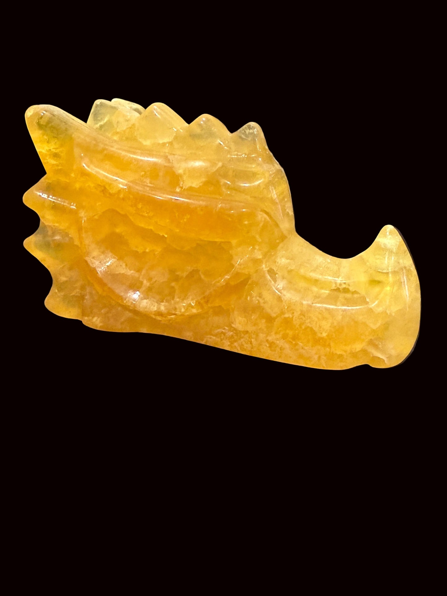 Yellow fluorite crystal dragon head carving lifestyle shot side