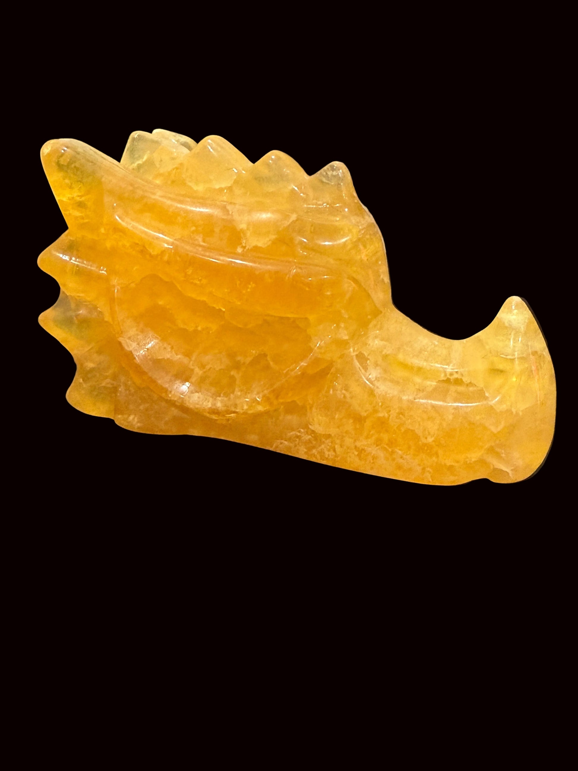 Yellow fluorite crystal dragon head carving lifestyle shot back