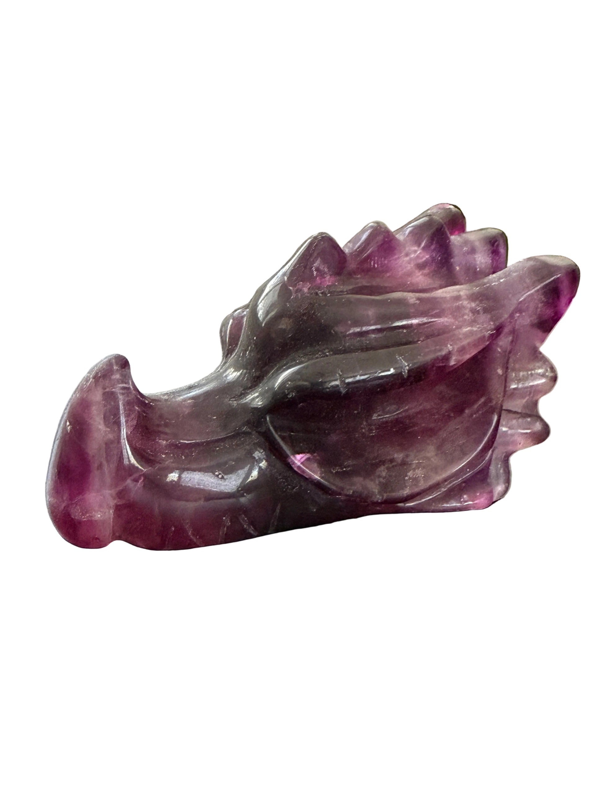Purple fluorite crystal dragon head carving lifestyle shot showing full piece