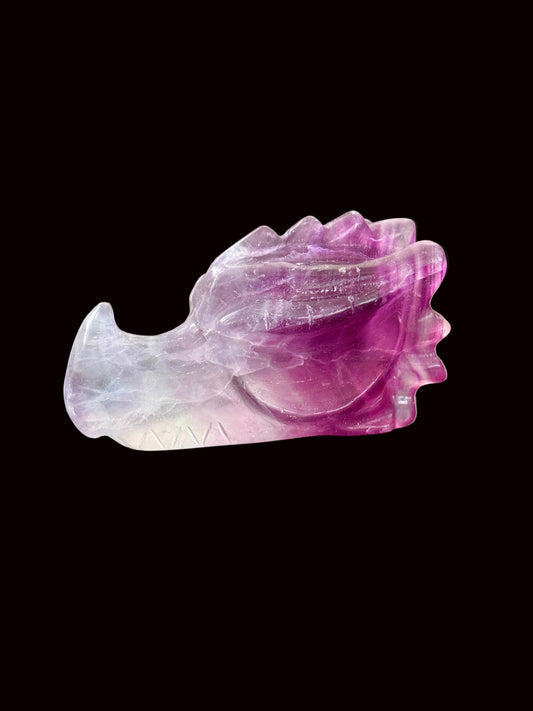 Lavender purple fluorite crystal dragon head carving opposite side view showing gradient