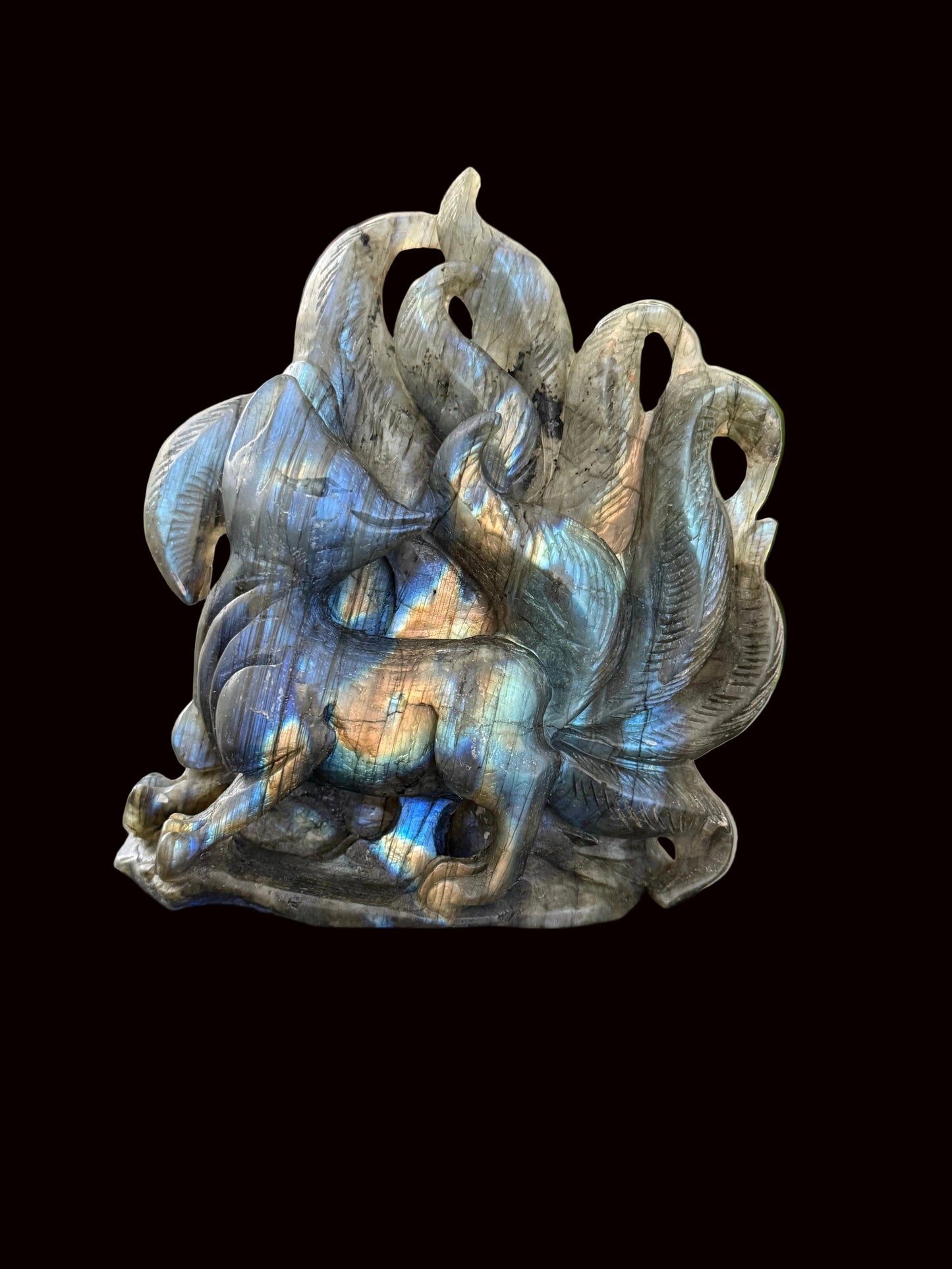 Labradorite nine-tail fox crystal carving three-quarter view showing full sculpture