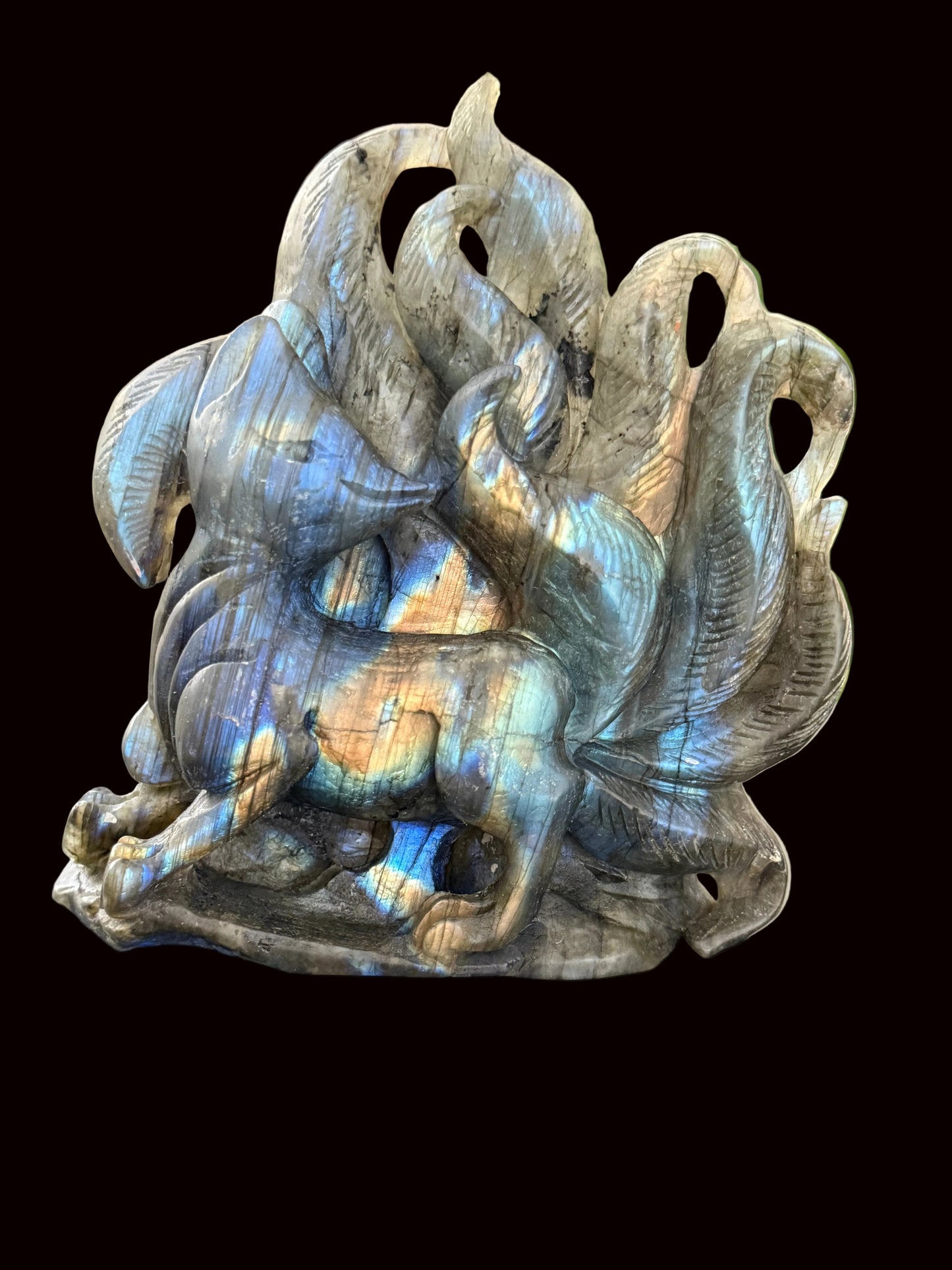 Labradorite nine-tail fox crystal carving front view showing blue and gold flash