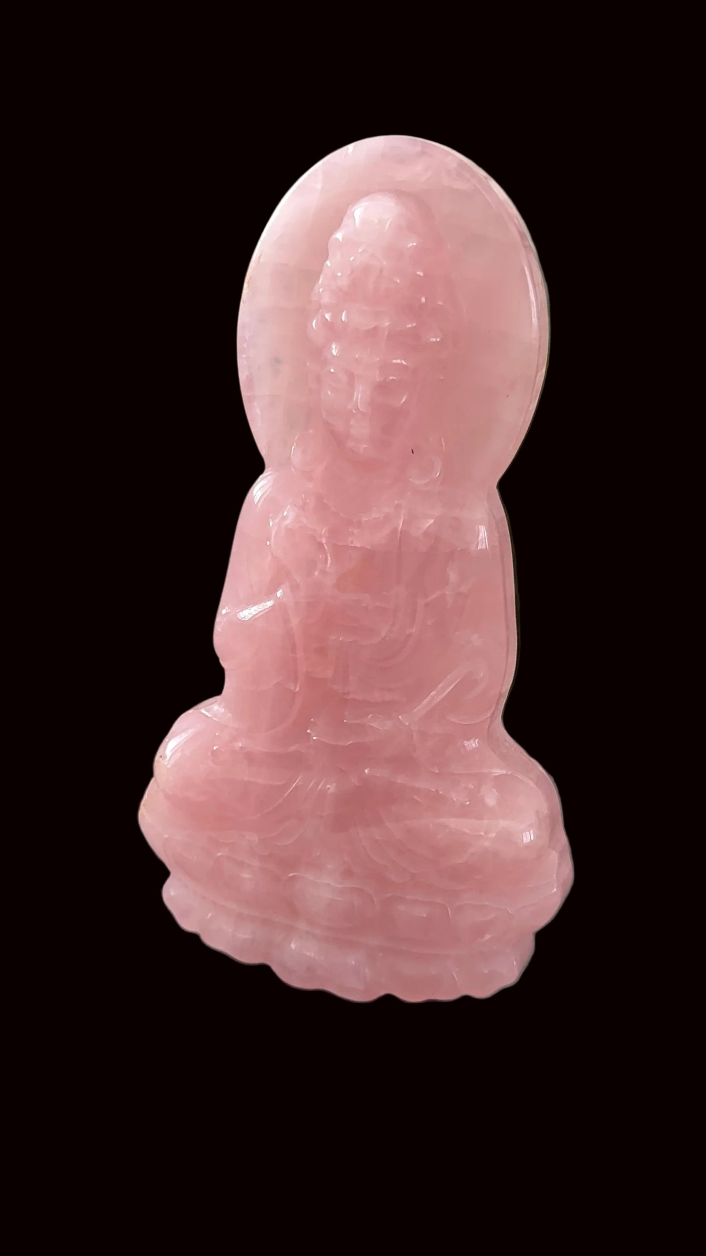 Rose quartz Guan Yin carving three-quarter view showing full sculpture height