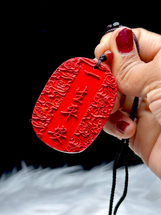 Cinnabar Crystal Pendant Necklace with Meditating Buddha Carving