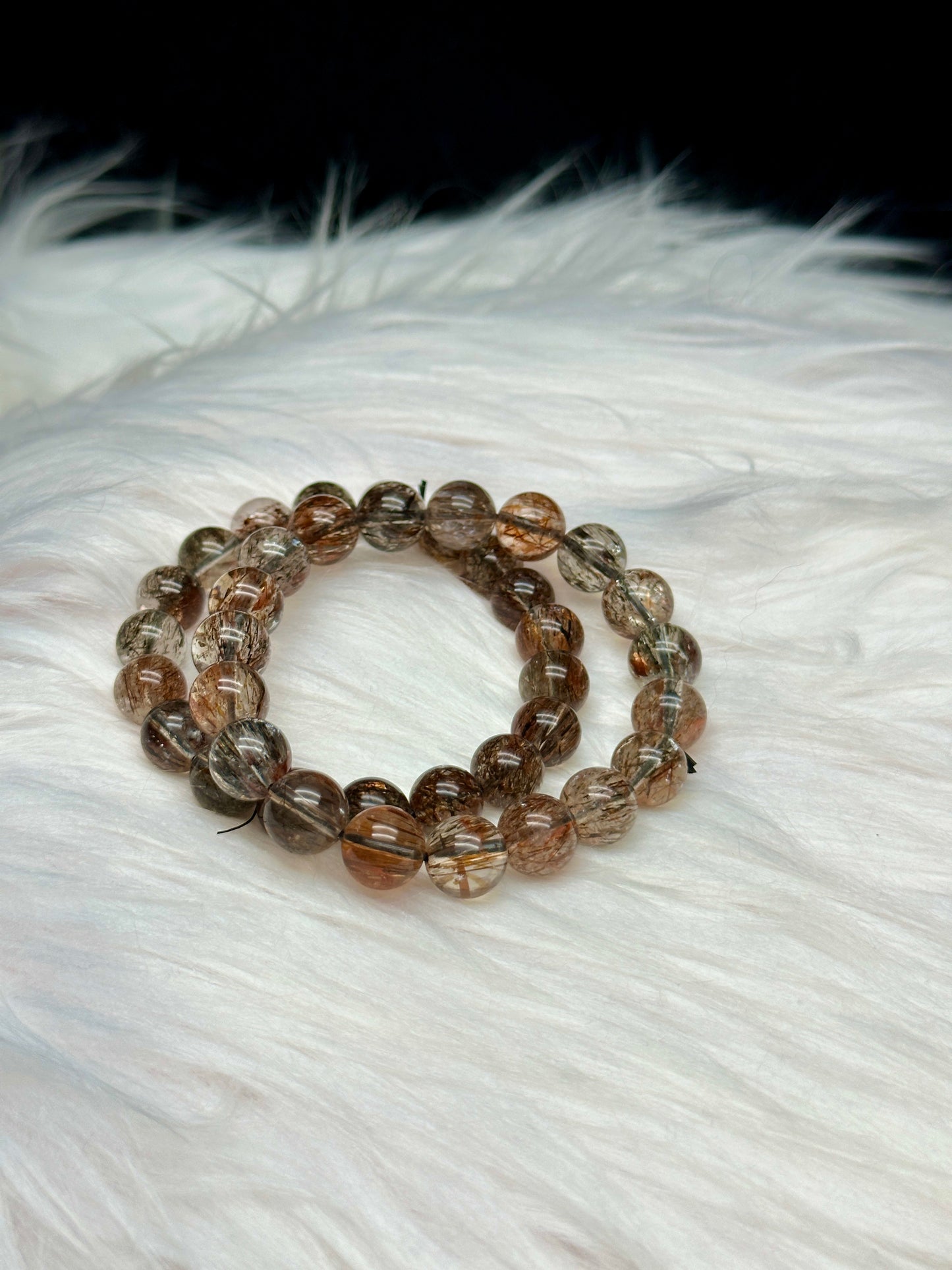 Discover the Power of Rare Rutilated Quartz Crystal with Our Exquisite Bracelet - 10mm Bead Size