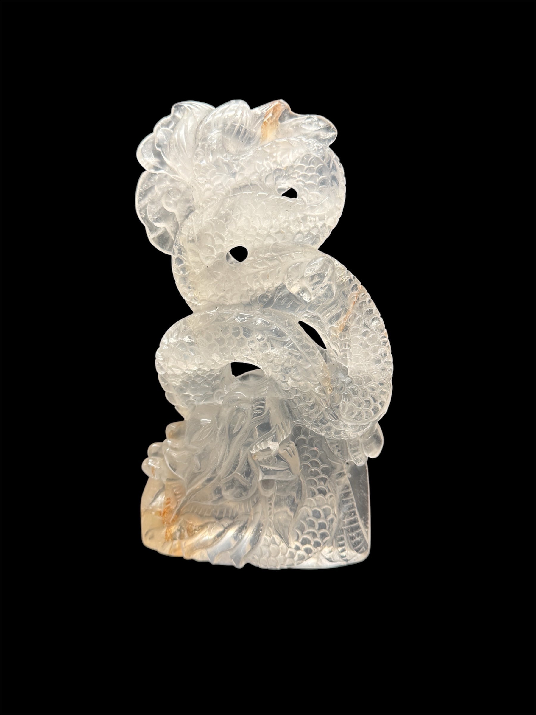 Clear quartz dragon carving - white background front