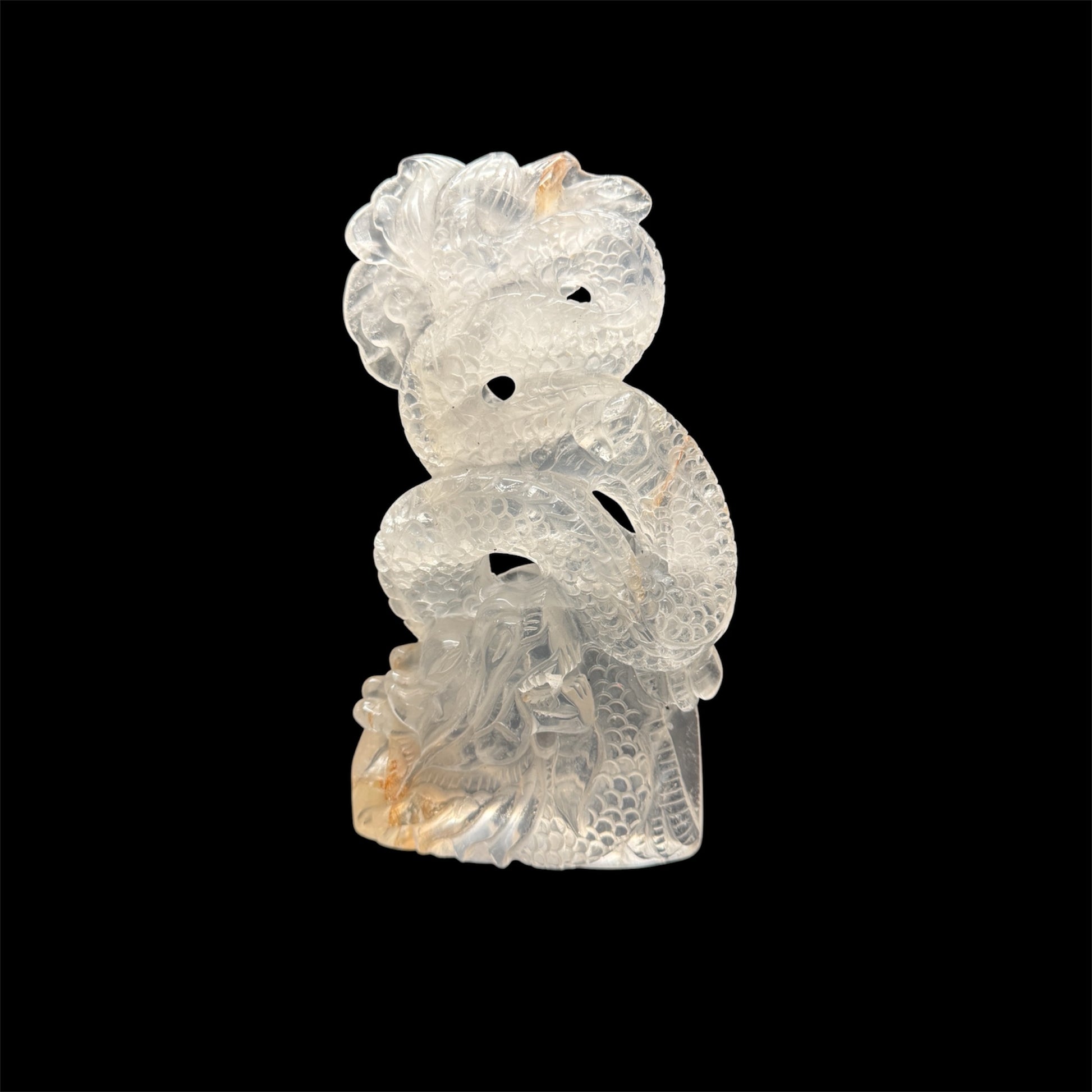 Clear quartz dragon carving - white background side