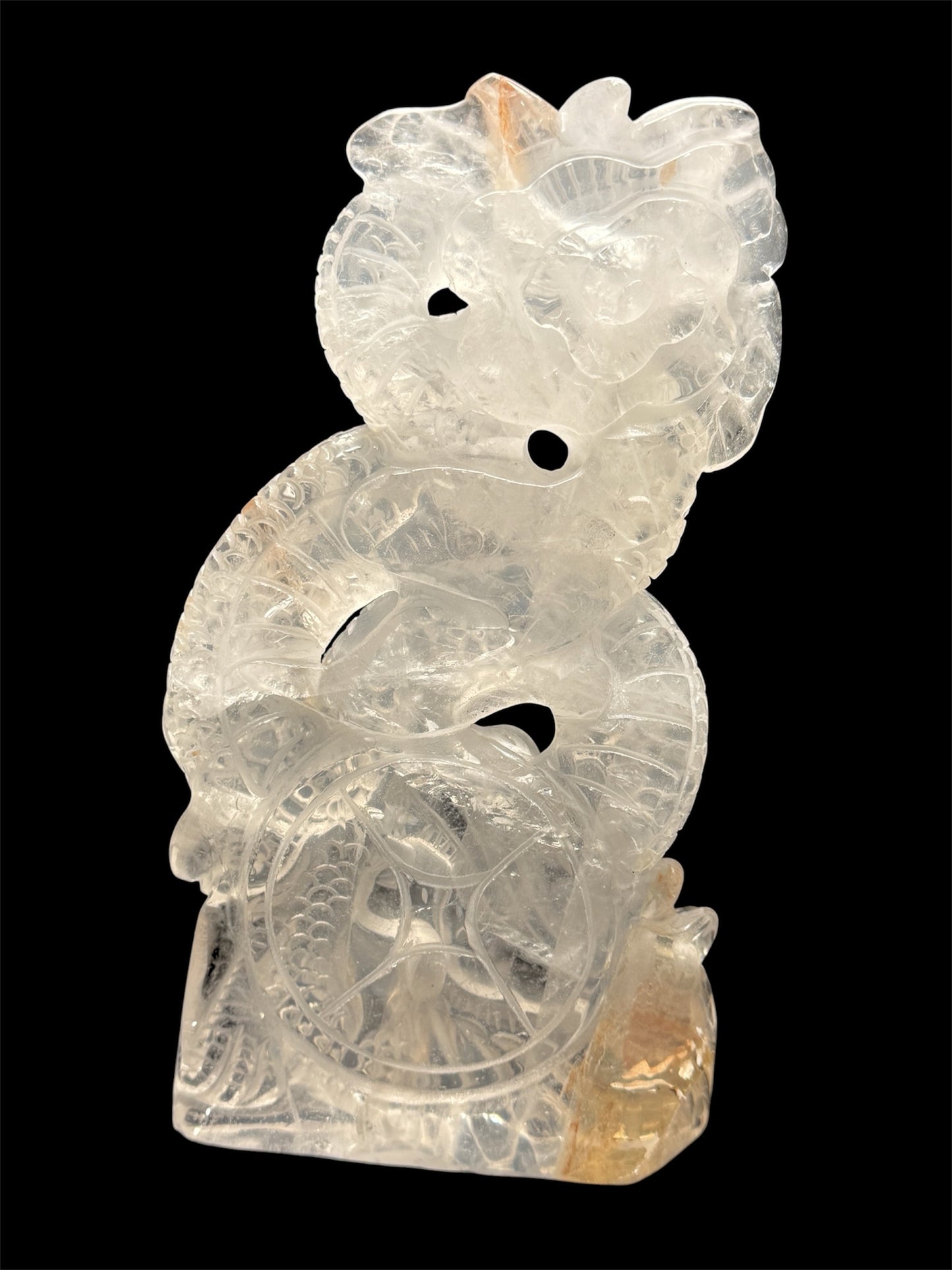 Clear quartz dragon carving - white background angle