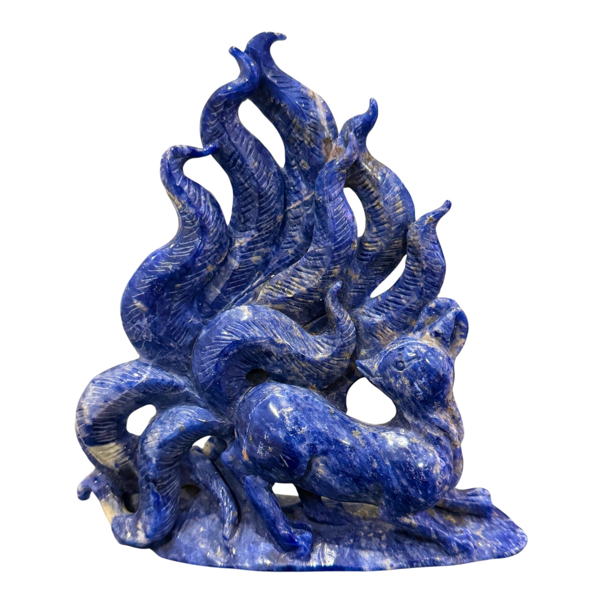 Sodalite nine-tail fox carving three-quarter view showing intricate tail detail and carved feather texture