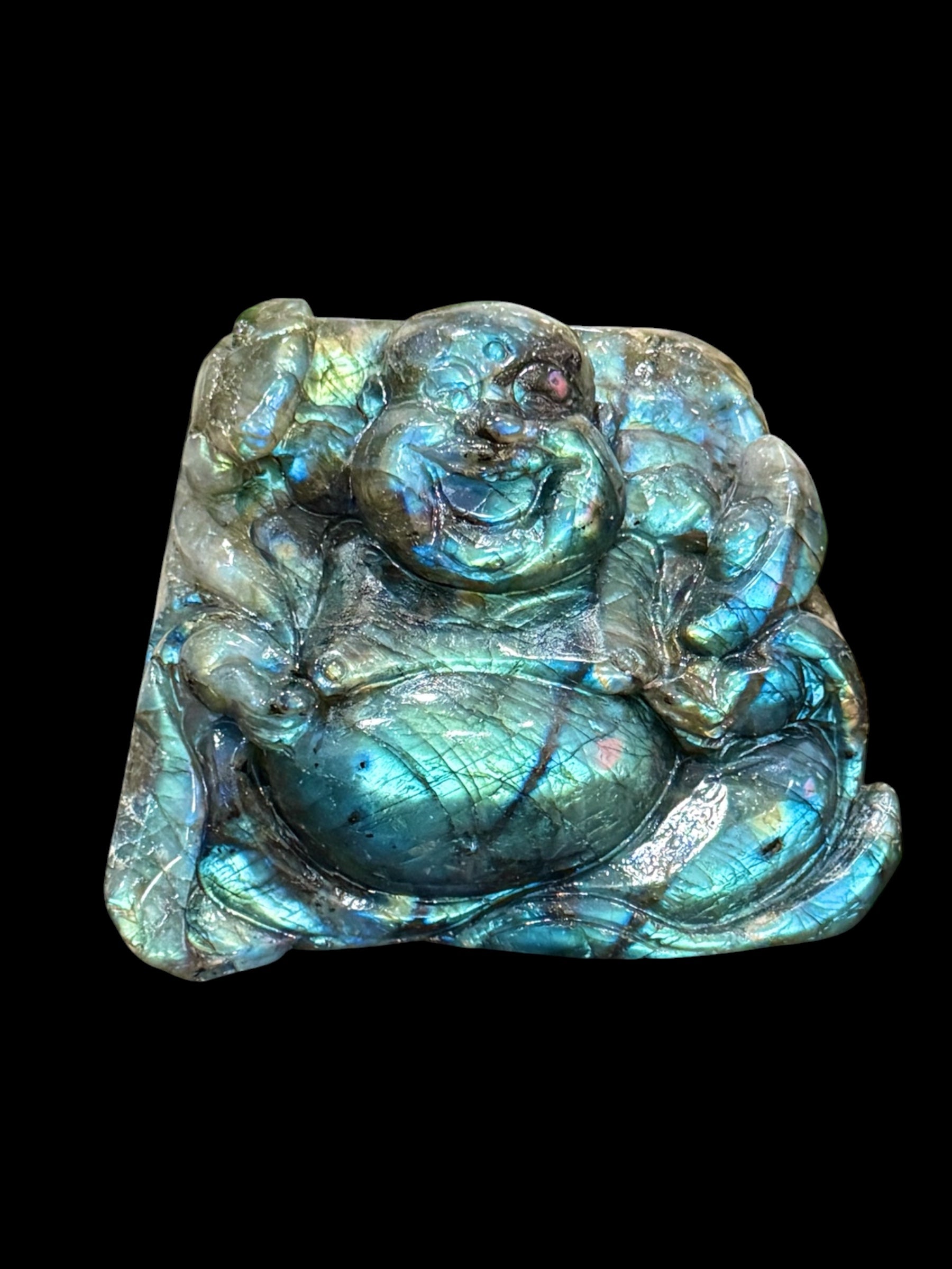 Hand-carved labradorite Buddha carving, front view, showing spectrolite flash