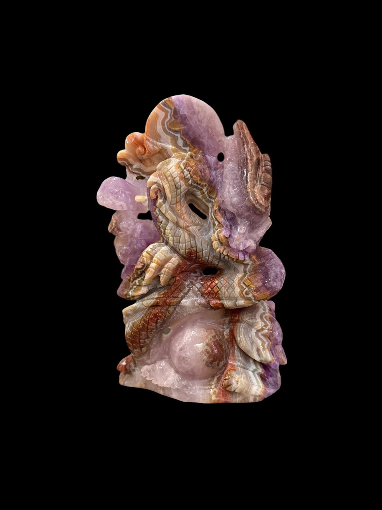 Amethyst lace agate dragon carving front view showing intricate scale detail and natural amethyst clusters