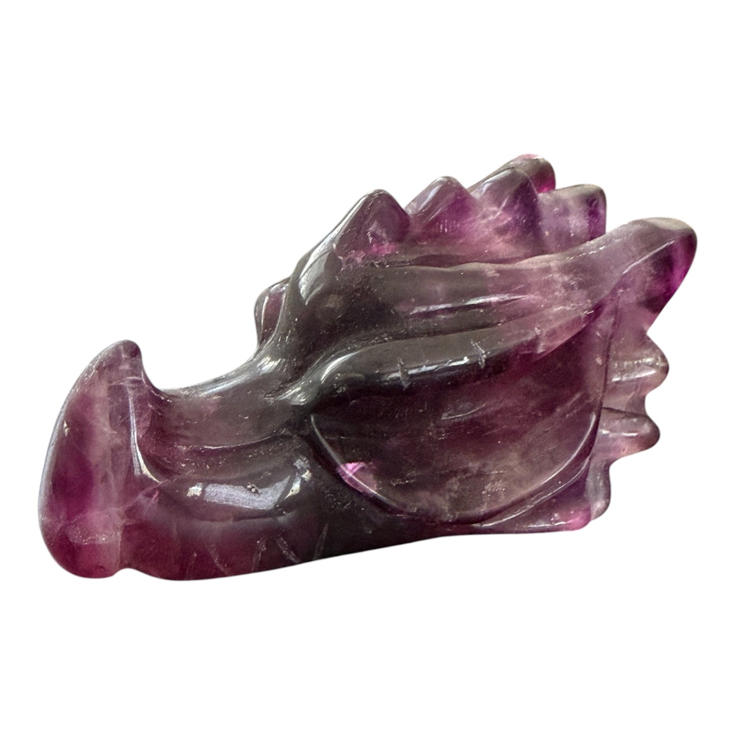 Purple fluorite crystal dragon head carving clean white background product shot