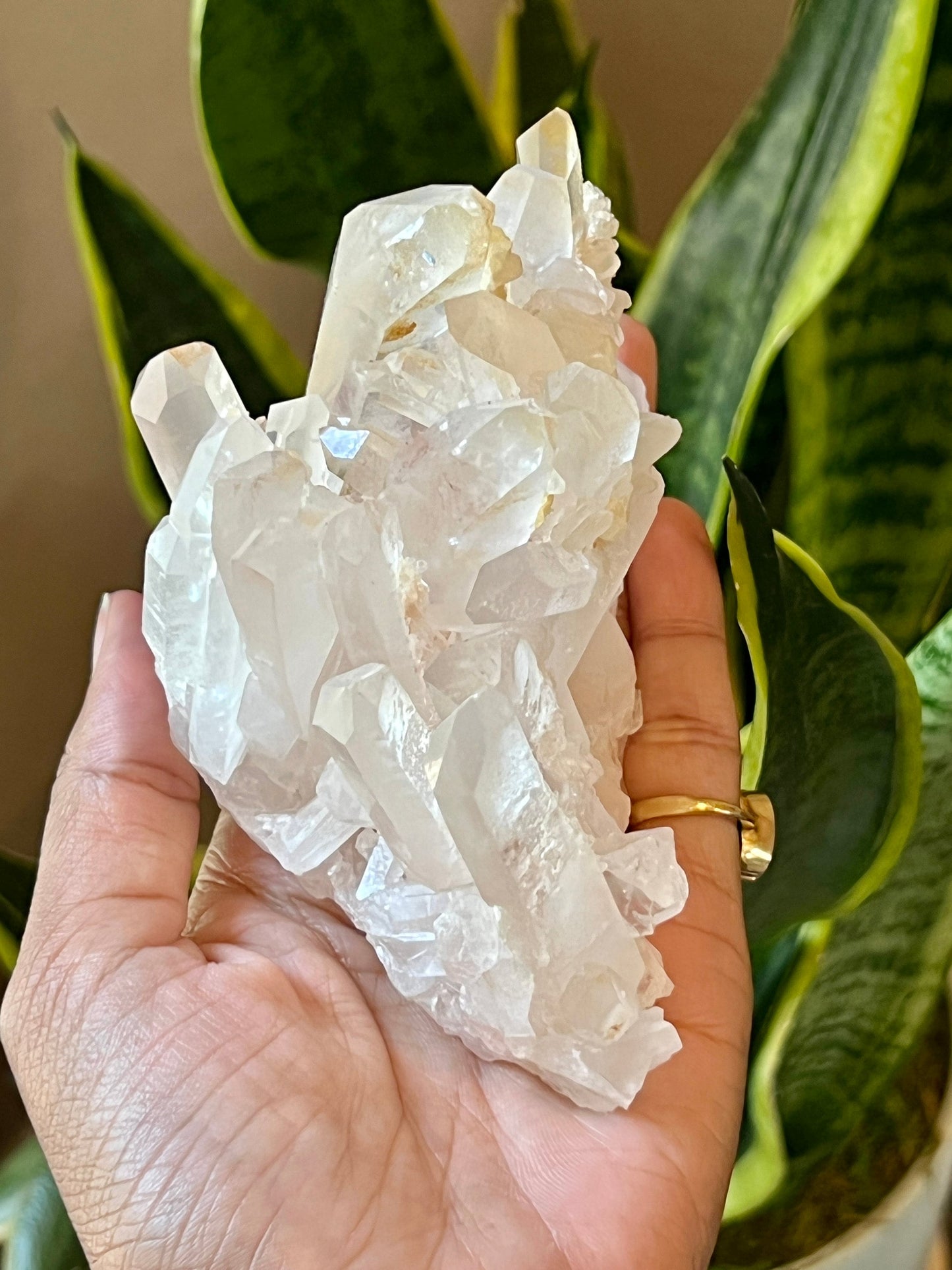 Clear quartz cluster with golden healer and Hematite inclusion