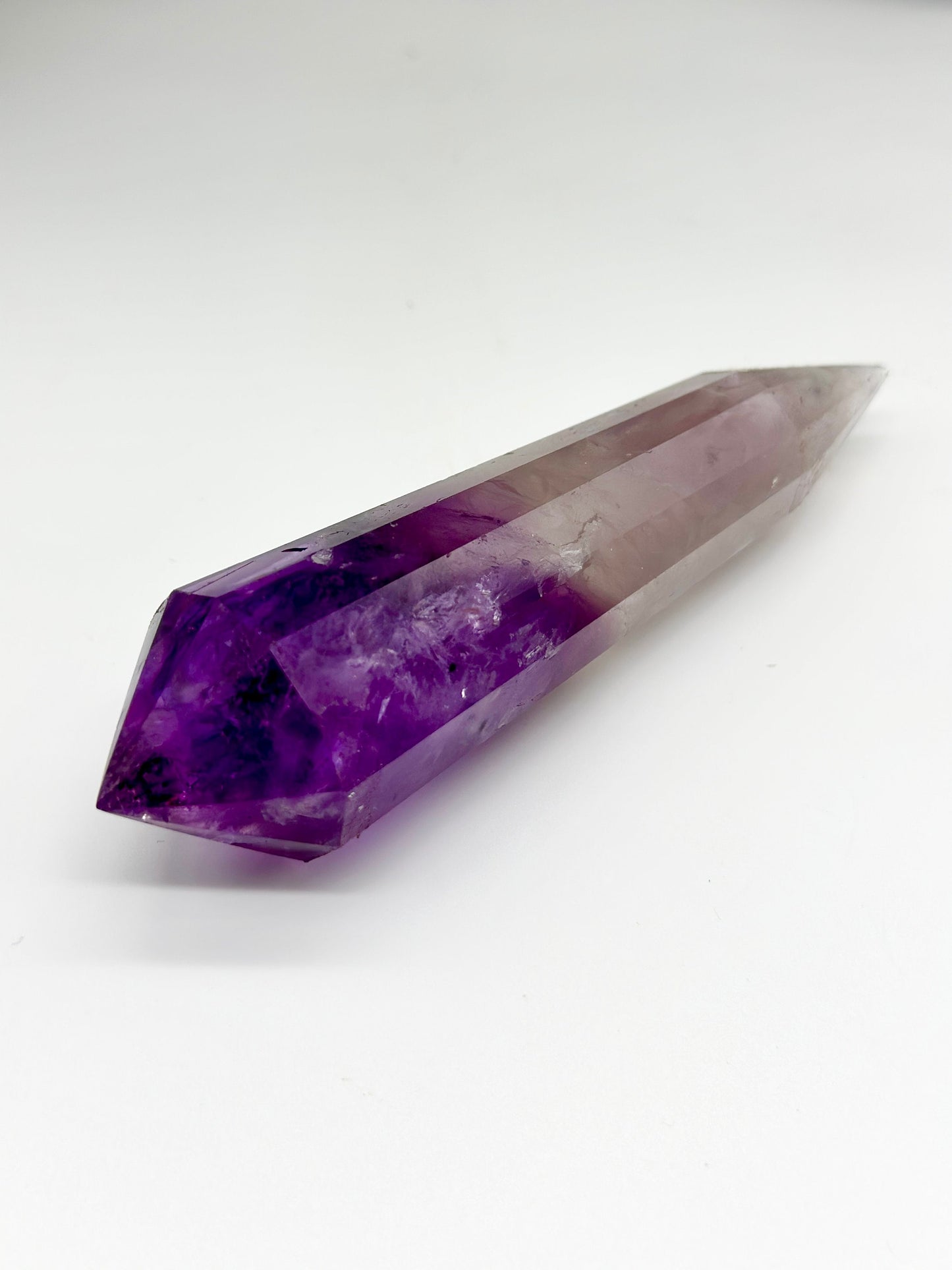 Amethyst Crystal Vogel point with rainbow inclusions 5 1/2"