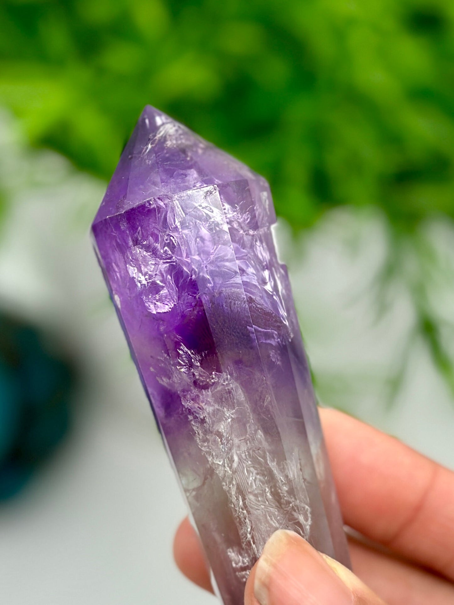 Amethyst Crystal Vogel point with rainbow inclusions 5 1/2"