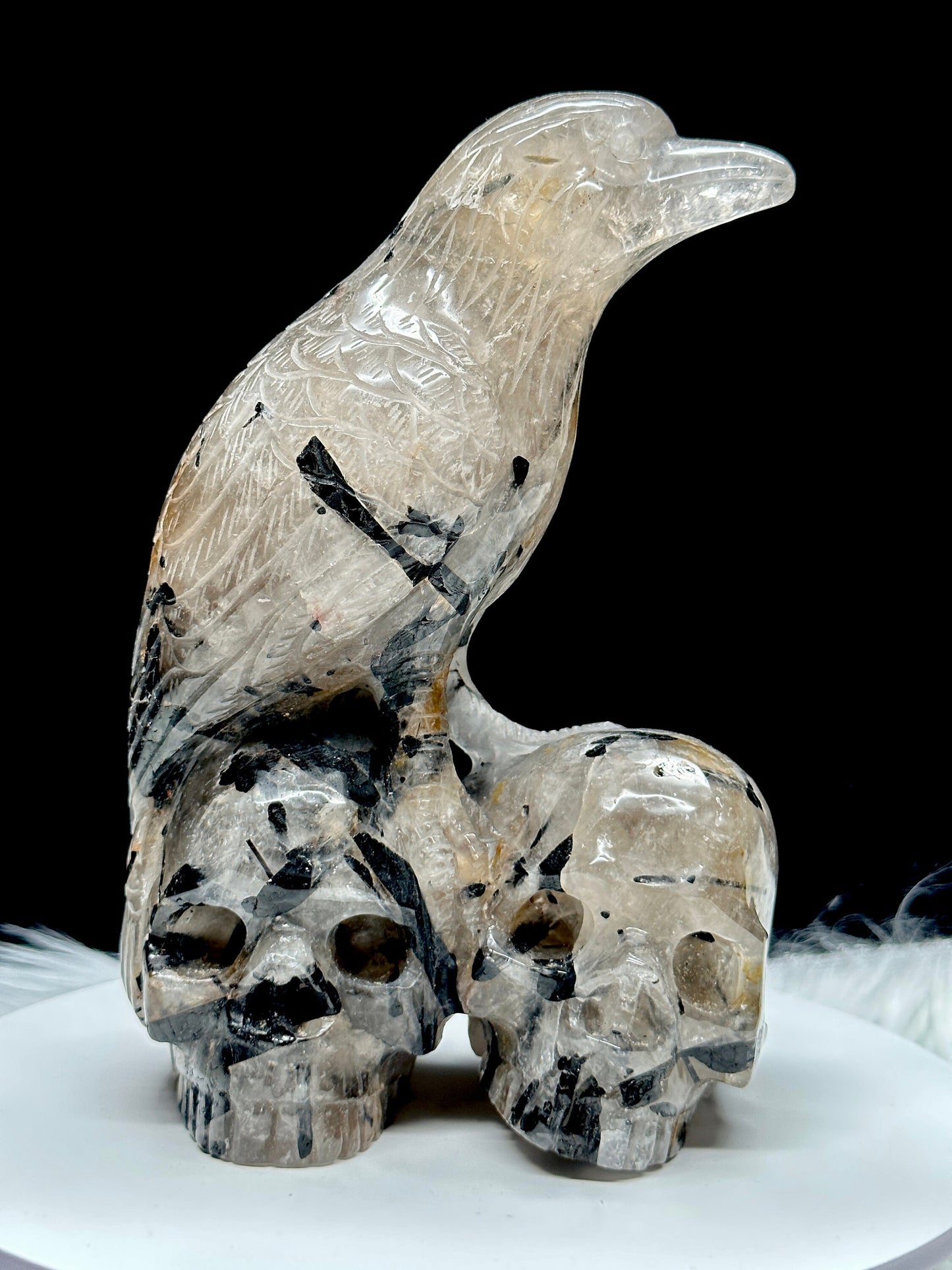 Black Tourmaline In Quartz Raven Skull, Raven Standing on Two Skulls (11") Rutilated Quartz, Black Tourmaline in Quartz Skull