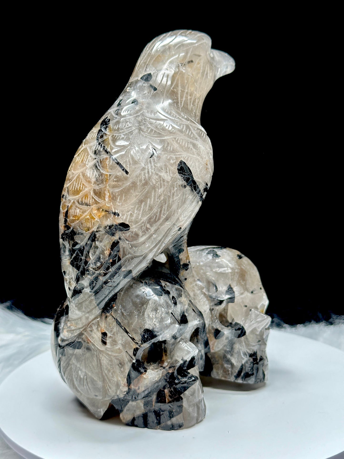 Black Tourmaline In Quartz Raven Skull, Raven Standing on Two Skulls (11") Rutilated Quartz, Black Tourmaline in Quartz Skull