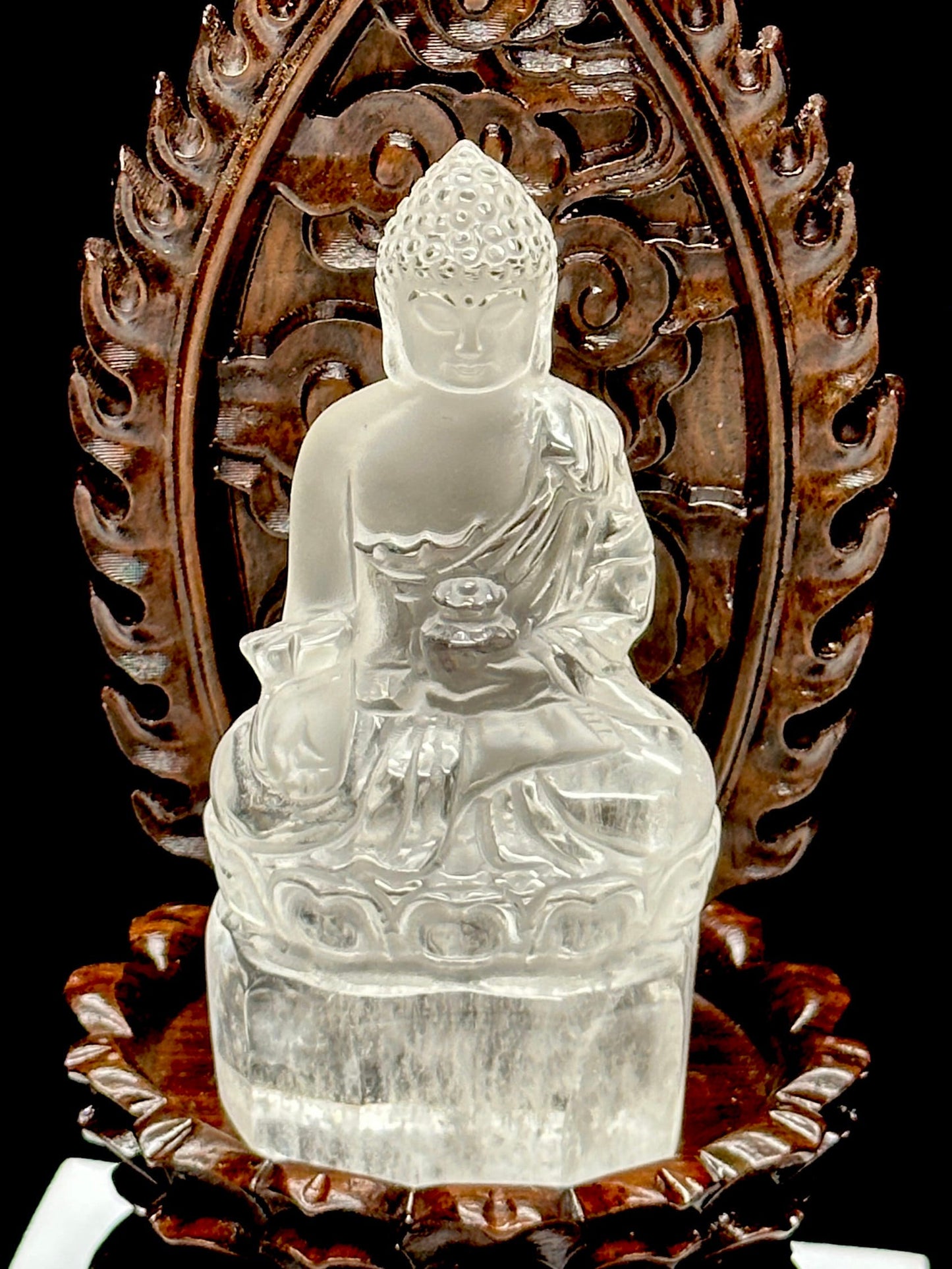 Clear Quartz Crystal Meditating Buddha Statue on a Carved Wooden Throne