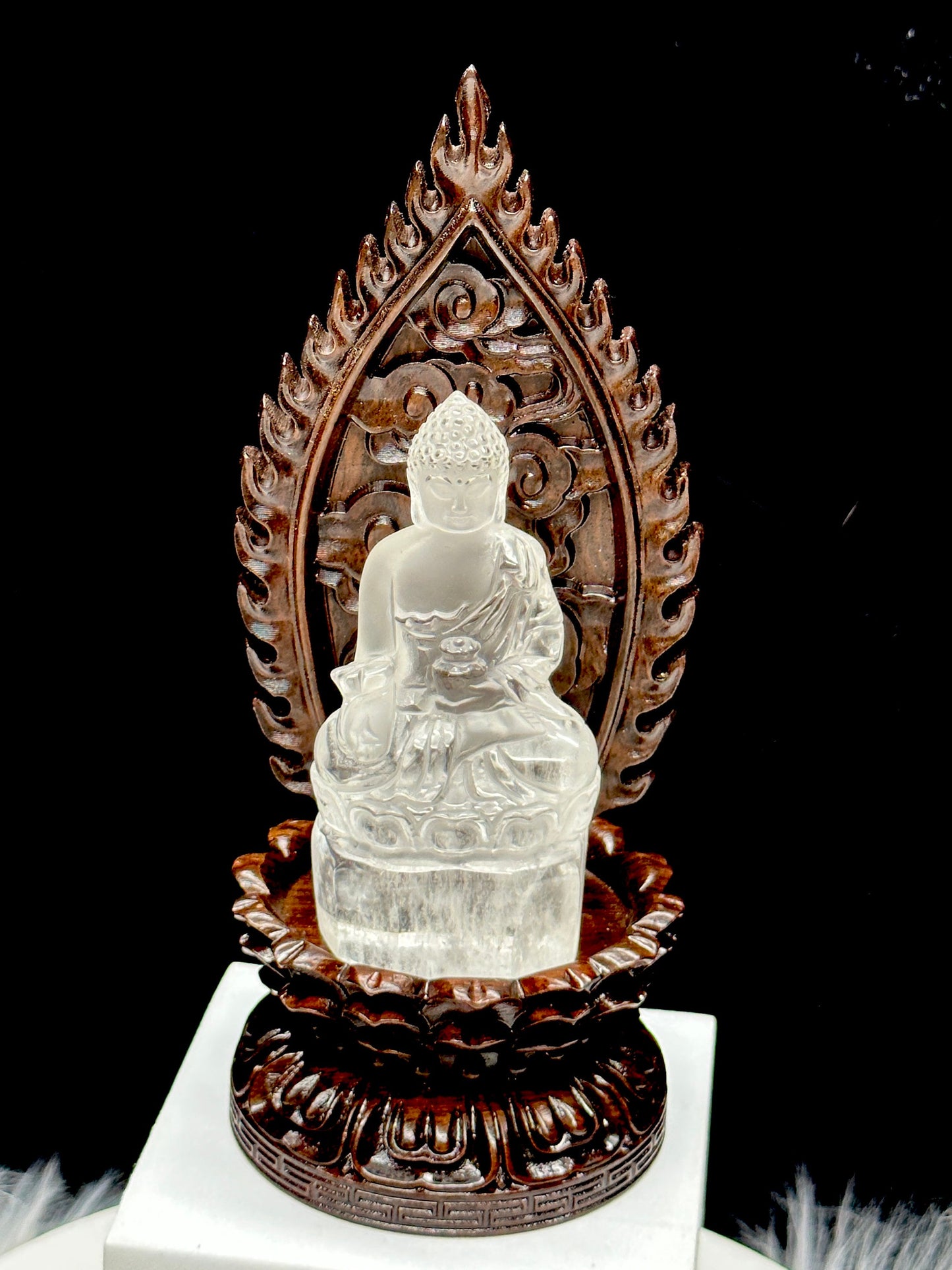 Clear Quartz Crystal Meditating Buddha Statue on a Carved Wooden Throne