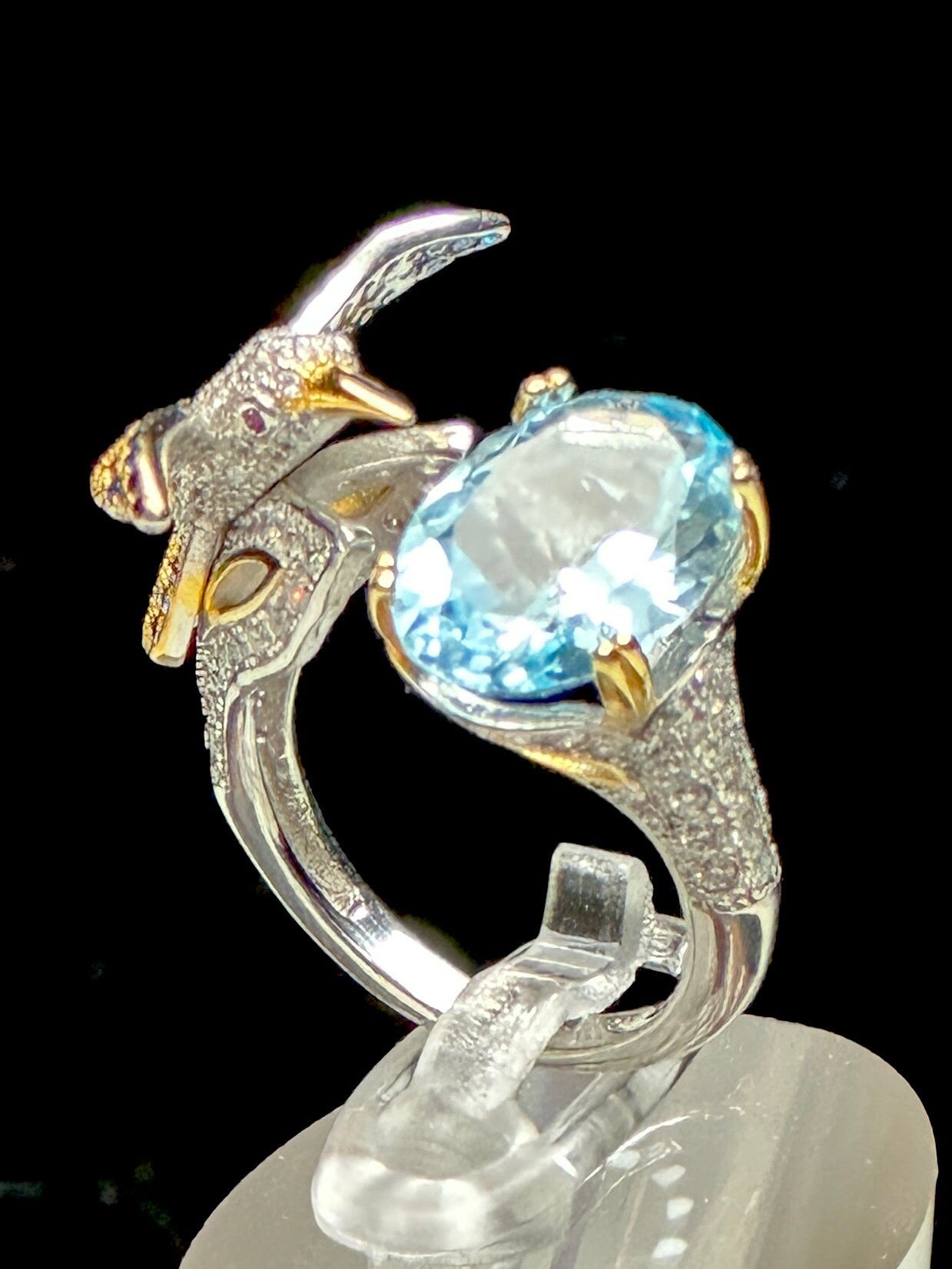 Blue Topaz Ring set in 925 Sterling silver with humming bird design, Adjustable Size