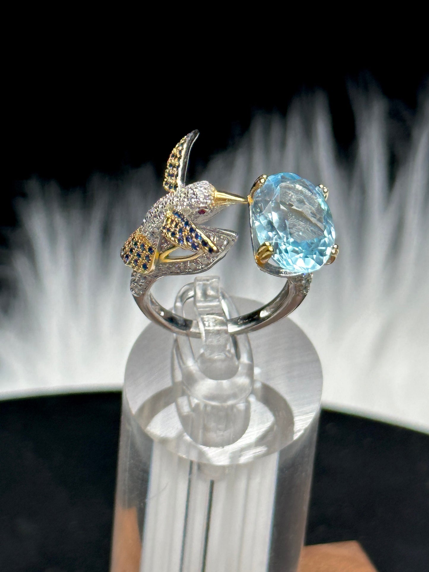 Blue Topaz Ring set in 925 Sterling silver with humming bird design, Adjustable Size