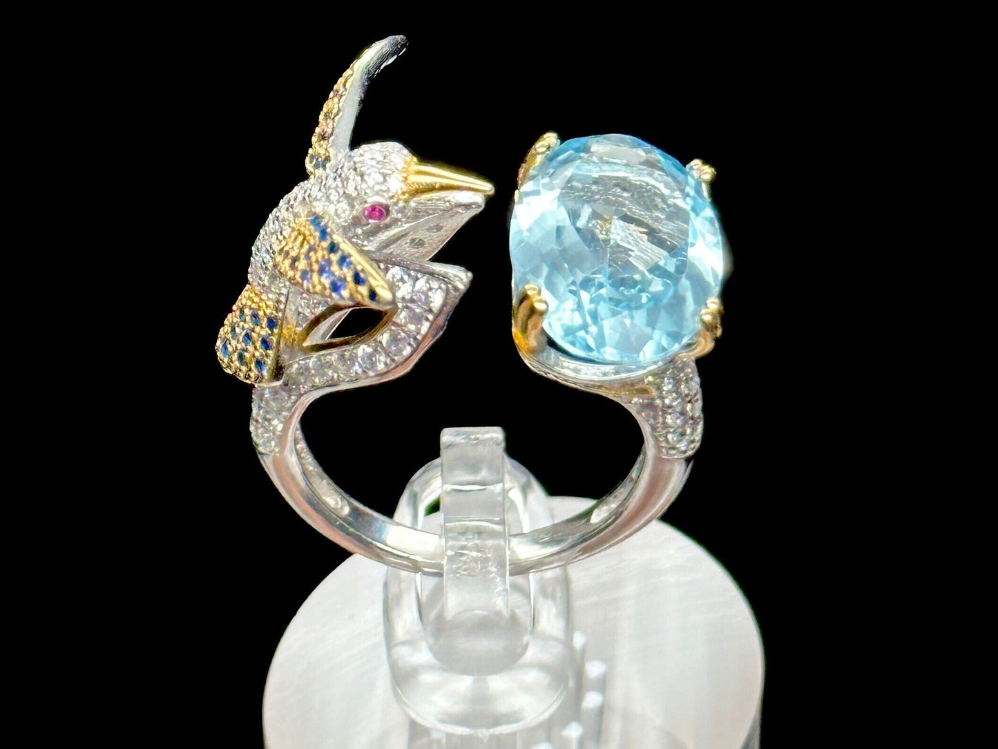 Blue Topaz Ring set in 925 Sterling silver with humming bird design, Adjustable Size