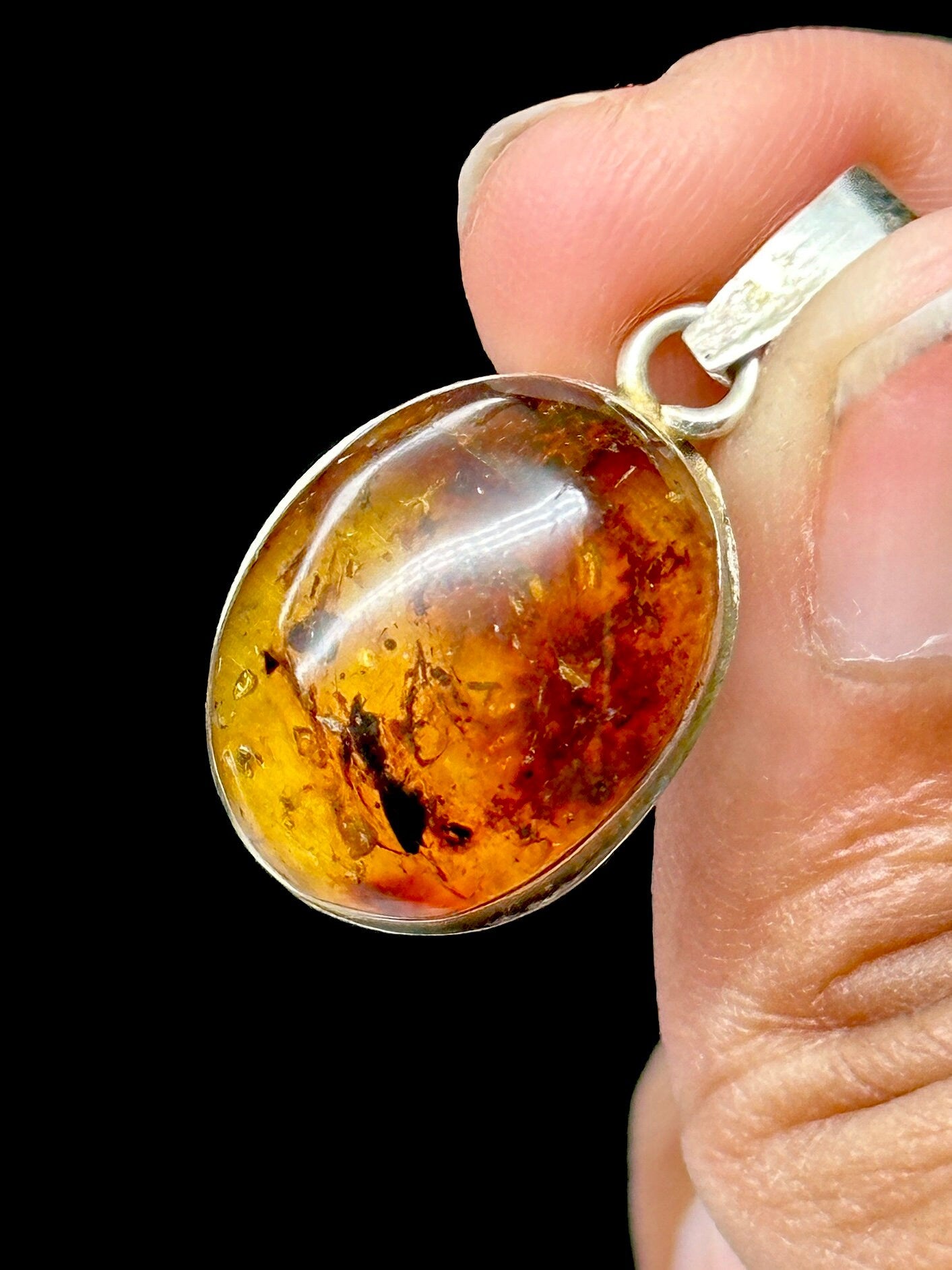 Pretty Natural Amber Pendant in Sterling Silver