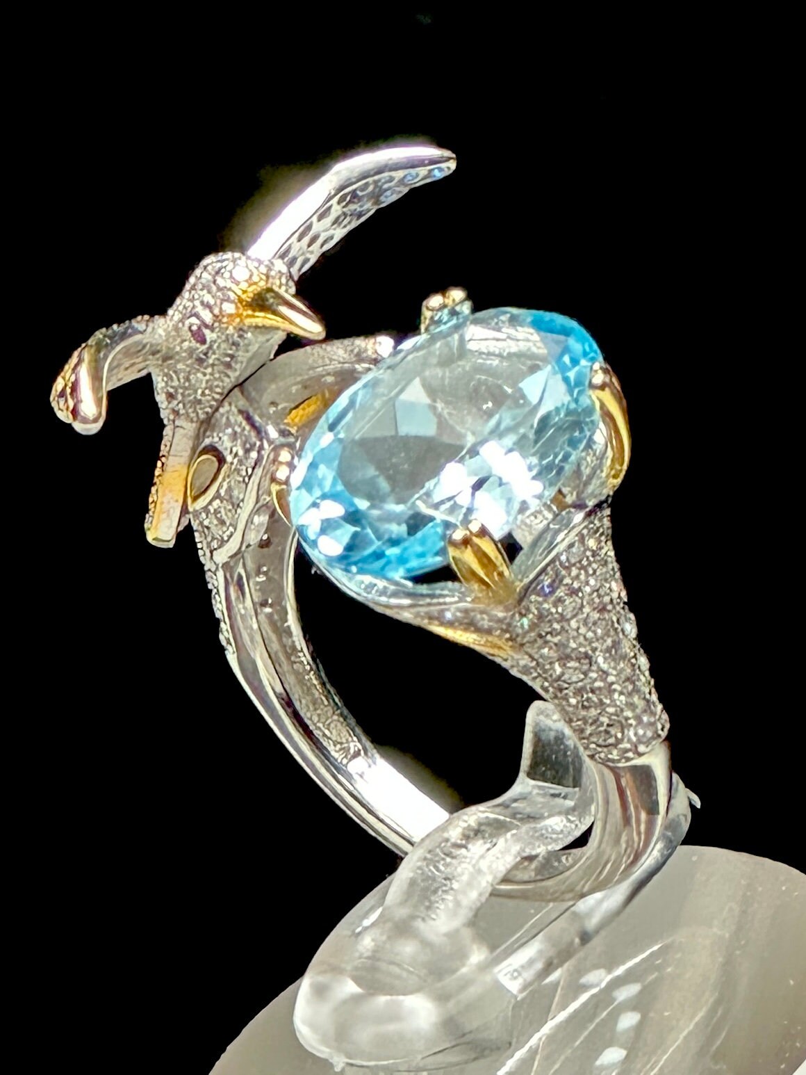 Blue Topaz Ring set in 925 Sterling silver with humming bird design, Adjustable Size