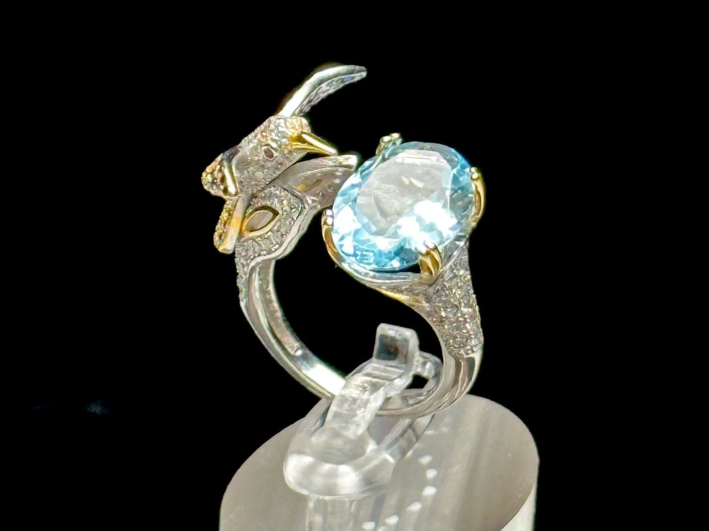 Blue Topaz Ring set in 925 Sterling silver with humming bird design, Adjustable Size