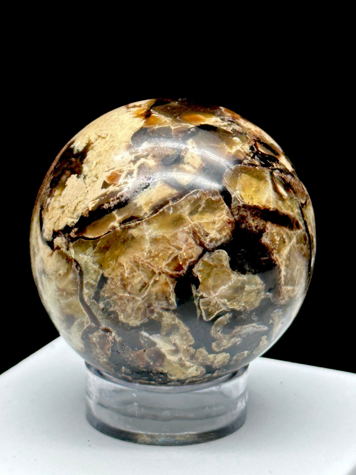 Pretty banded Dominican Amber Sphere