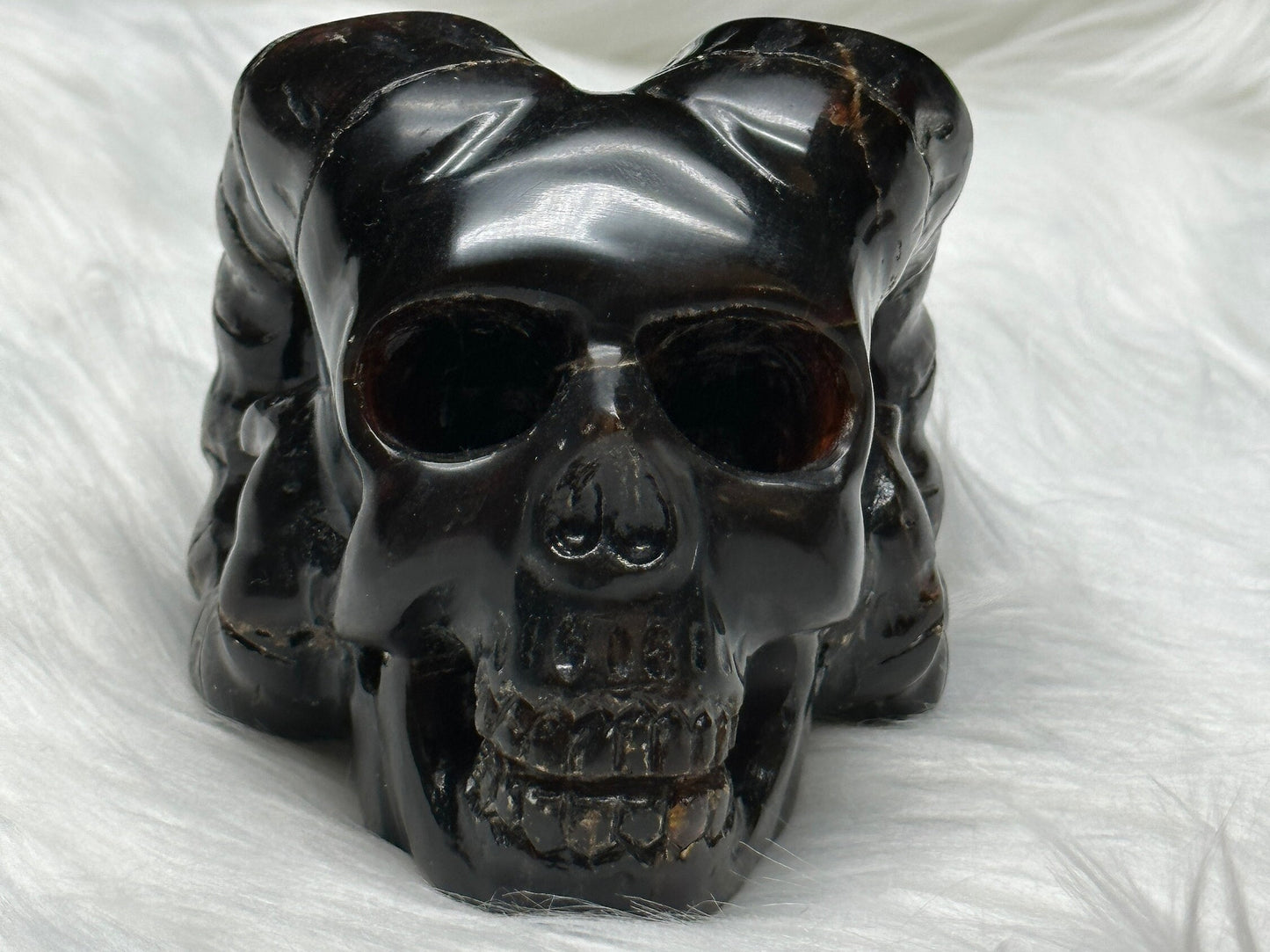 Rare Blue Amber Skull with Horns Carving